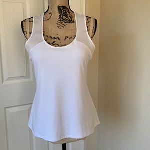 Calvin Klein NWOT sleeveless top w sheer upper outline. Excellent condition.